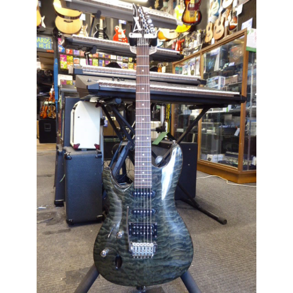 <p>Lovely HSS guitar with quilted maple top and transparent grey finish.&nbsp; Made in Korea (2003/04).</p><p>Condition: A couple of small dents and various pick scrapes and belt-buckle scrapes.</p>