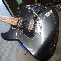 <p>Standard Series Squier Stratocaster with 2 x humbucking pickups, tremolo system, '70s style headstock, and more.</p><p>Condition: The 'Squier' logo has been scraped off the headstock!&nbsp; There are a few small scuffs , but otherwise it's very good.</p>