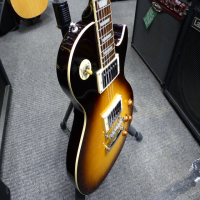 <p>Tokai Les Paul copy with a great action and tone.</p><p>Condition: A few tiny marks and a couple of small dents in the top.&nbsp; No pickguard.</p>