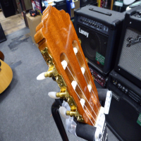 <p>Decent and affordable classical guitar with solid cedar top.</p><p>Condition: A few minor scuffs, otherwise excellent.</p>