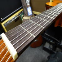 <p>Decent and affordable classical guitar with solid cedar top.</p><p>Condition: A few minor scuffs, otherwise excellent.</p>