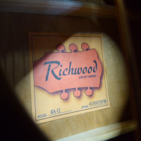 Decent entry-level acoustic guitar in good condition.